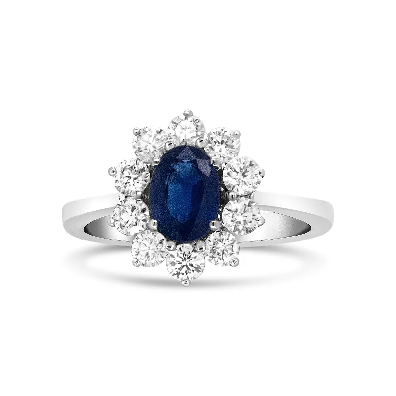 best men’s wedding rings-18K White Gold 7x5 mm Oval Cut Blue Sapphire and Round Diamond 3/4 Cttw Sunburst Halo Ring