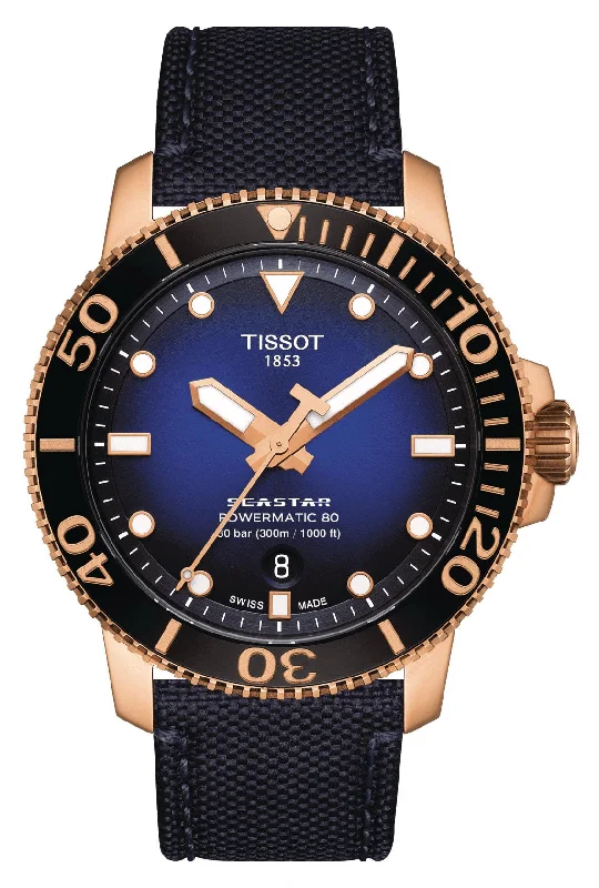 travel watches with world time function-Tissot T-Sport Seastar 1000 Automatic Powermatic 80 Rose Gold PVD Blue Dial Blue Textile Strap Date Mens Watch T120.407.37.041.00